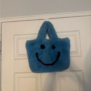 Dolls Kill Blue Fuzzy Smiley Bag
